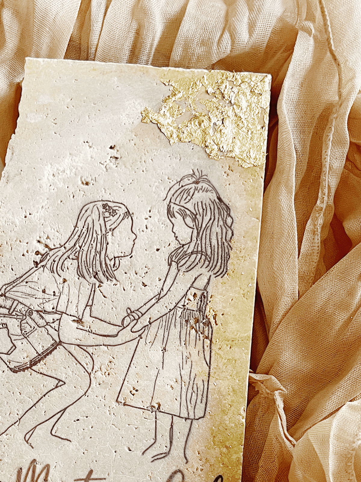 Illustration of two children holding hands on a textured stone surface with beige fabric in the background.