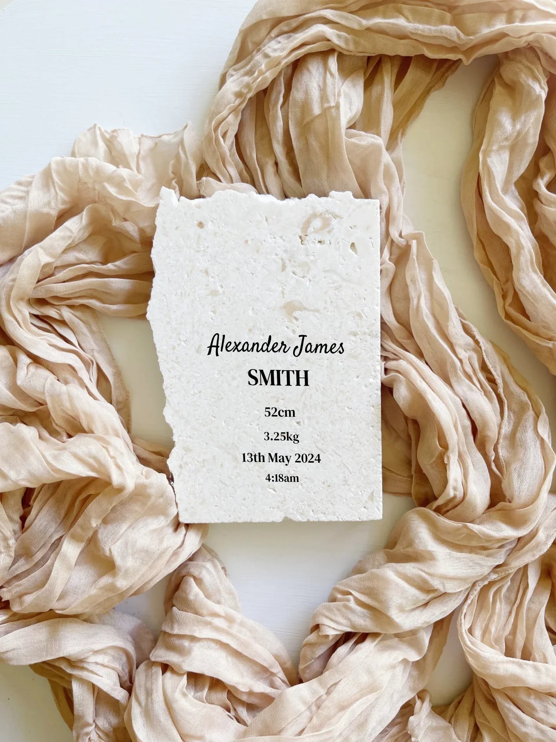 Limestone baby birth details keepsake in portrait style.