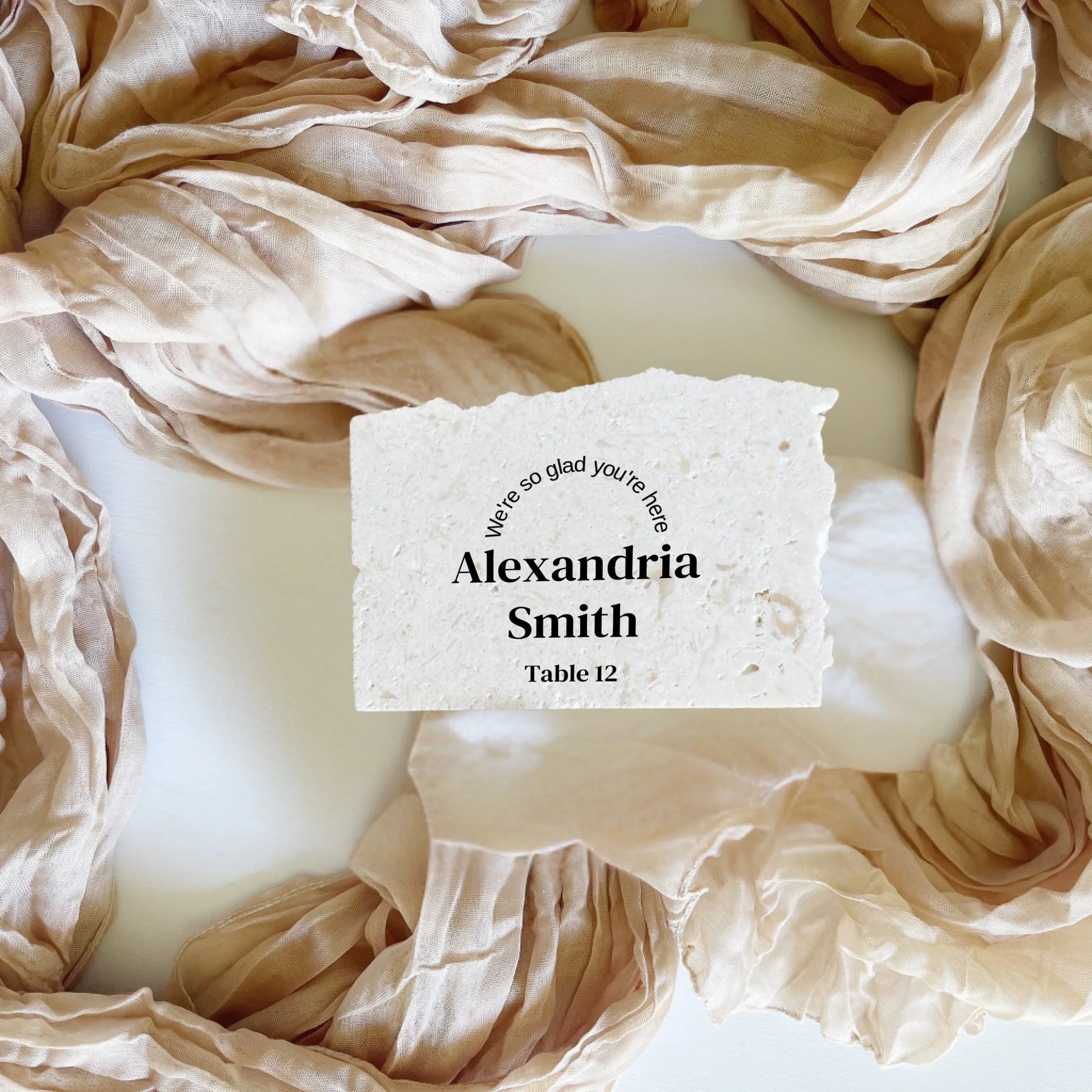 Limestone place cards in landscape style, personalised with name, number, styled for weddings, events.