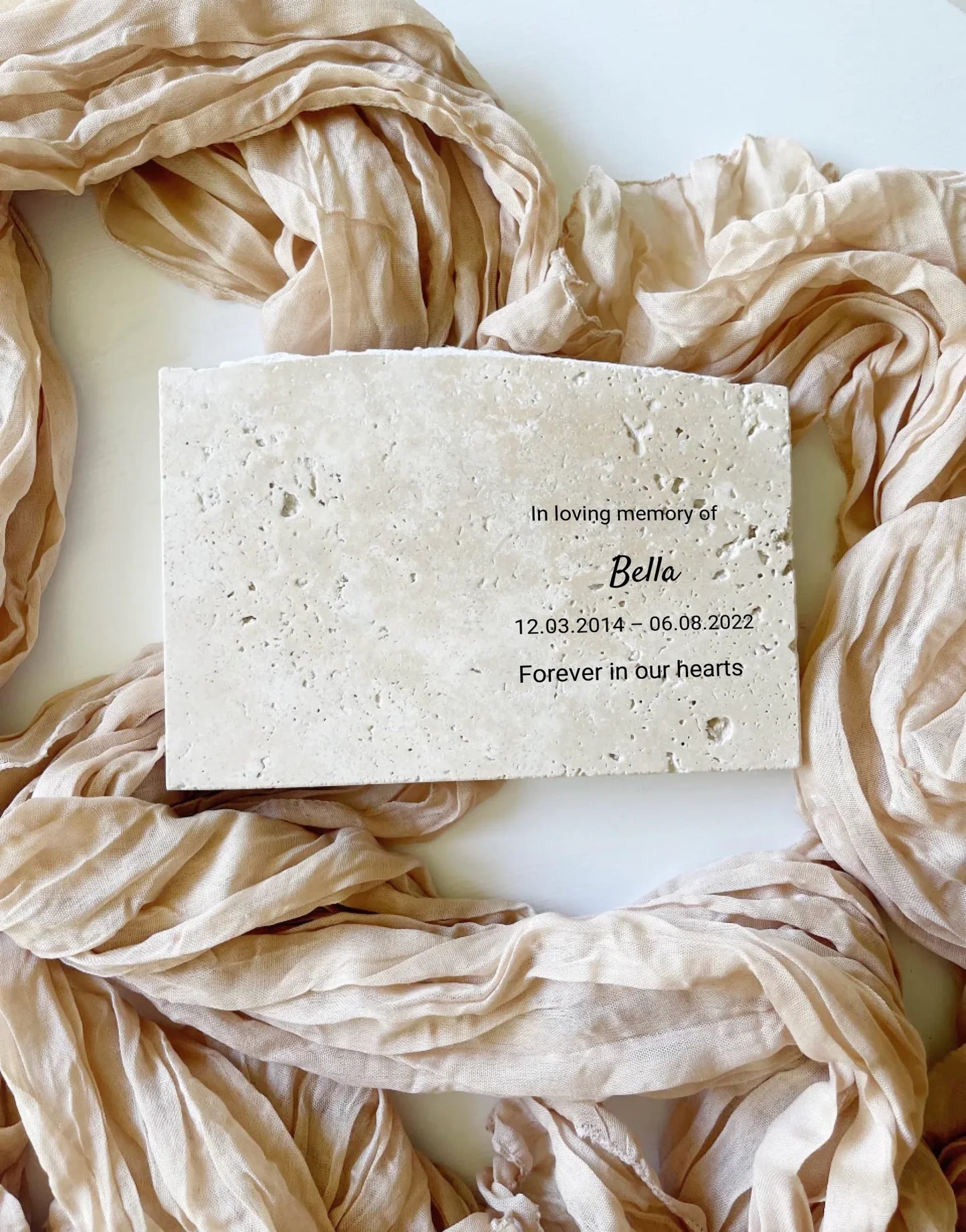 Travertine pet memorial keepsake in landscape style.